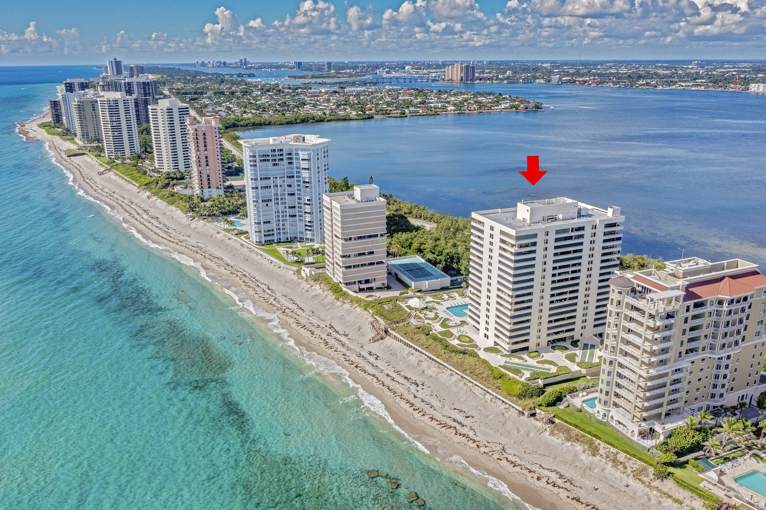 5280 North Ocean Drive, Unit 2F Singer Island, FL 33404 - Photo 2 of 92 a view of building with an outdoor space