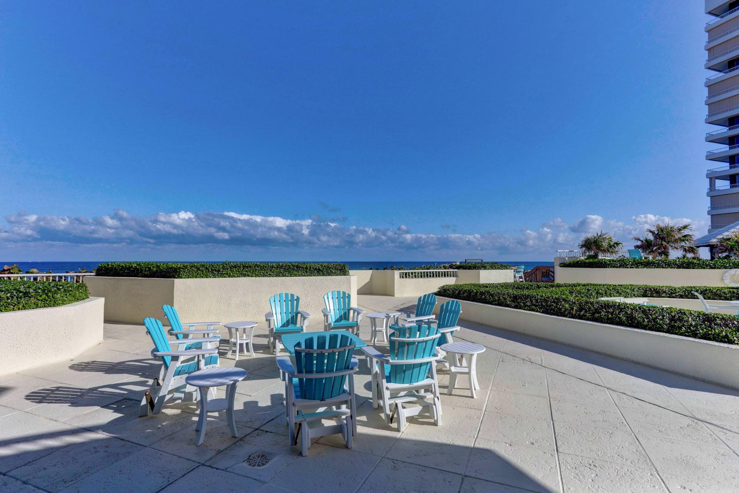 5280 North Ocean Drive, Unit 2F Singer Island, FL 33404 - Photo 57 of 92 a view of a terrace with furniture