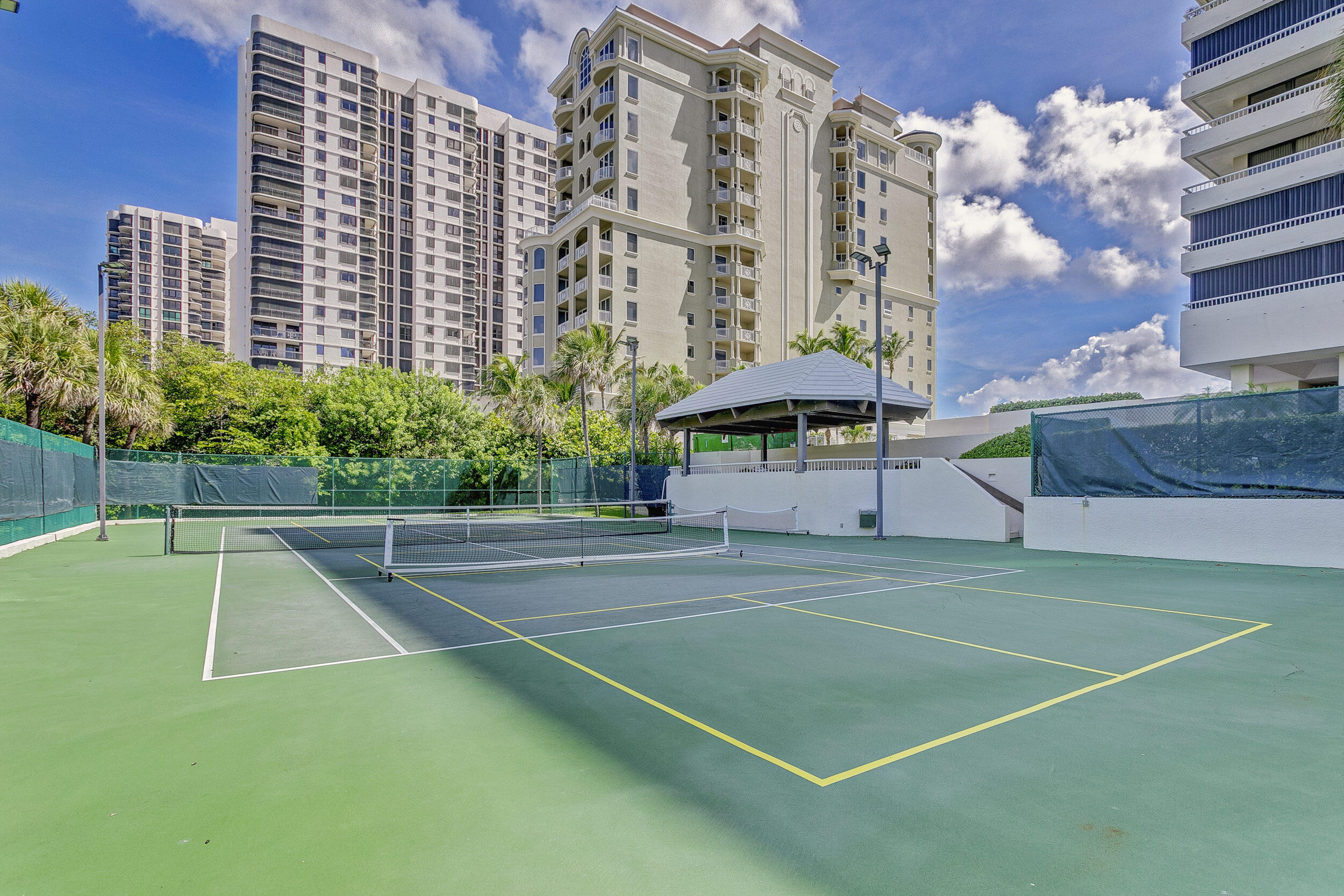 5280 North Ocean Drive, Unit 2F Singer Island, FL 33404 - Photo 65 of 92 a view of a tennis court