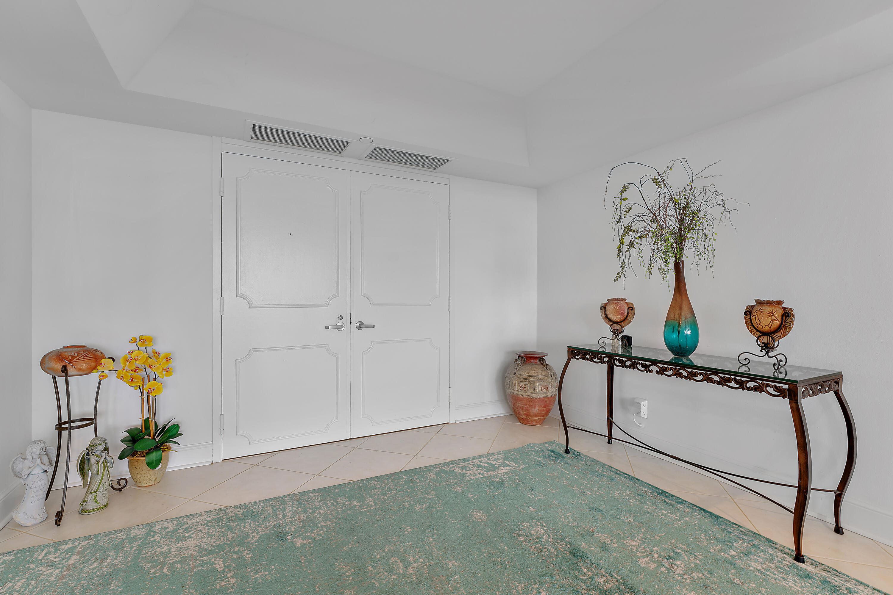 5280 North Ocean Drive, Unit 2F Singer Island, FL 33404 - Photo 7 of 92 a view of a room with gym equipment