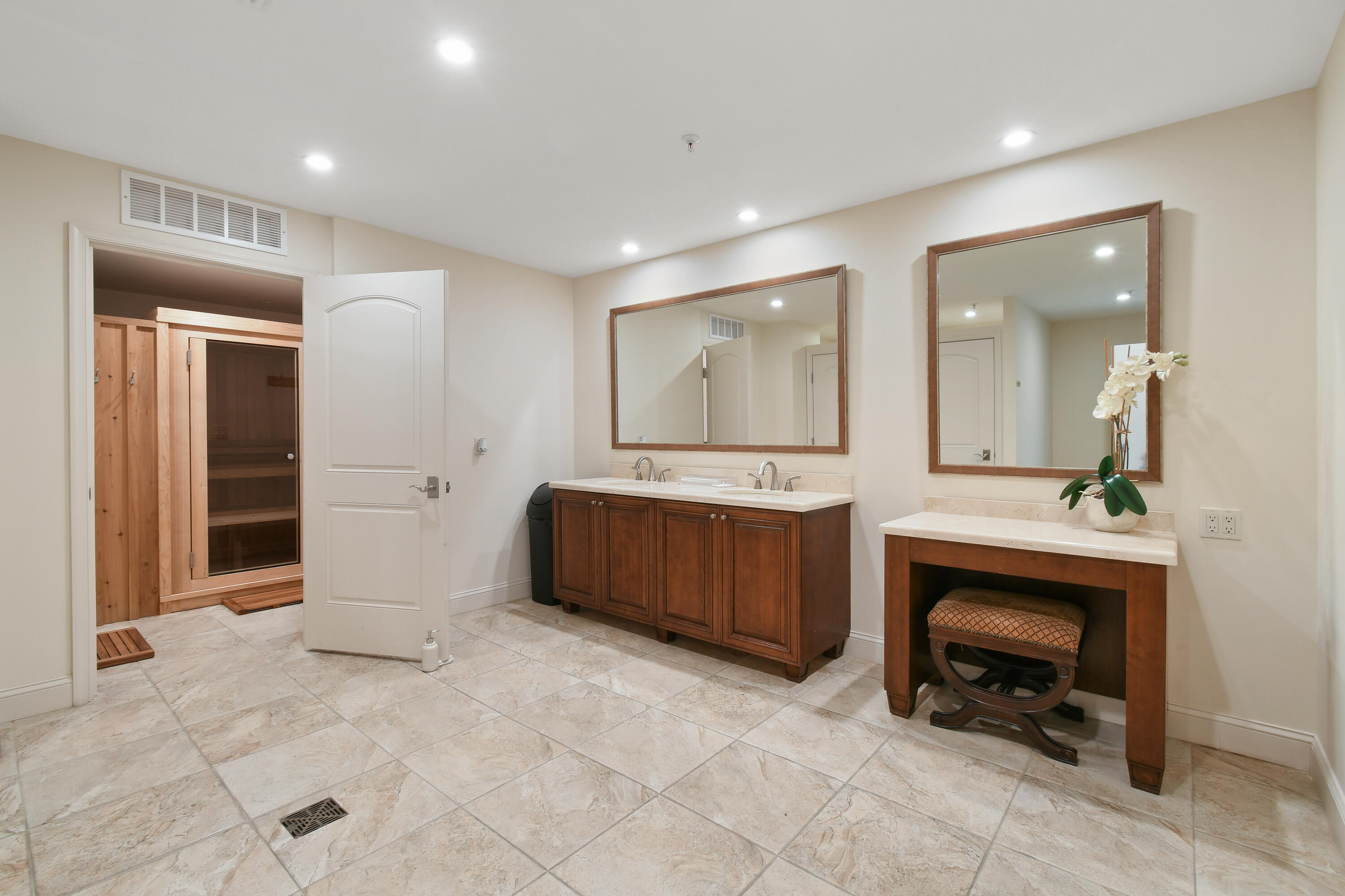 5280 North Ocean Drive, Unit 2F Singer Island, FL 33404 - Photo 71 of 92 a spacious bathroom with a sink a mirror and a bathtub