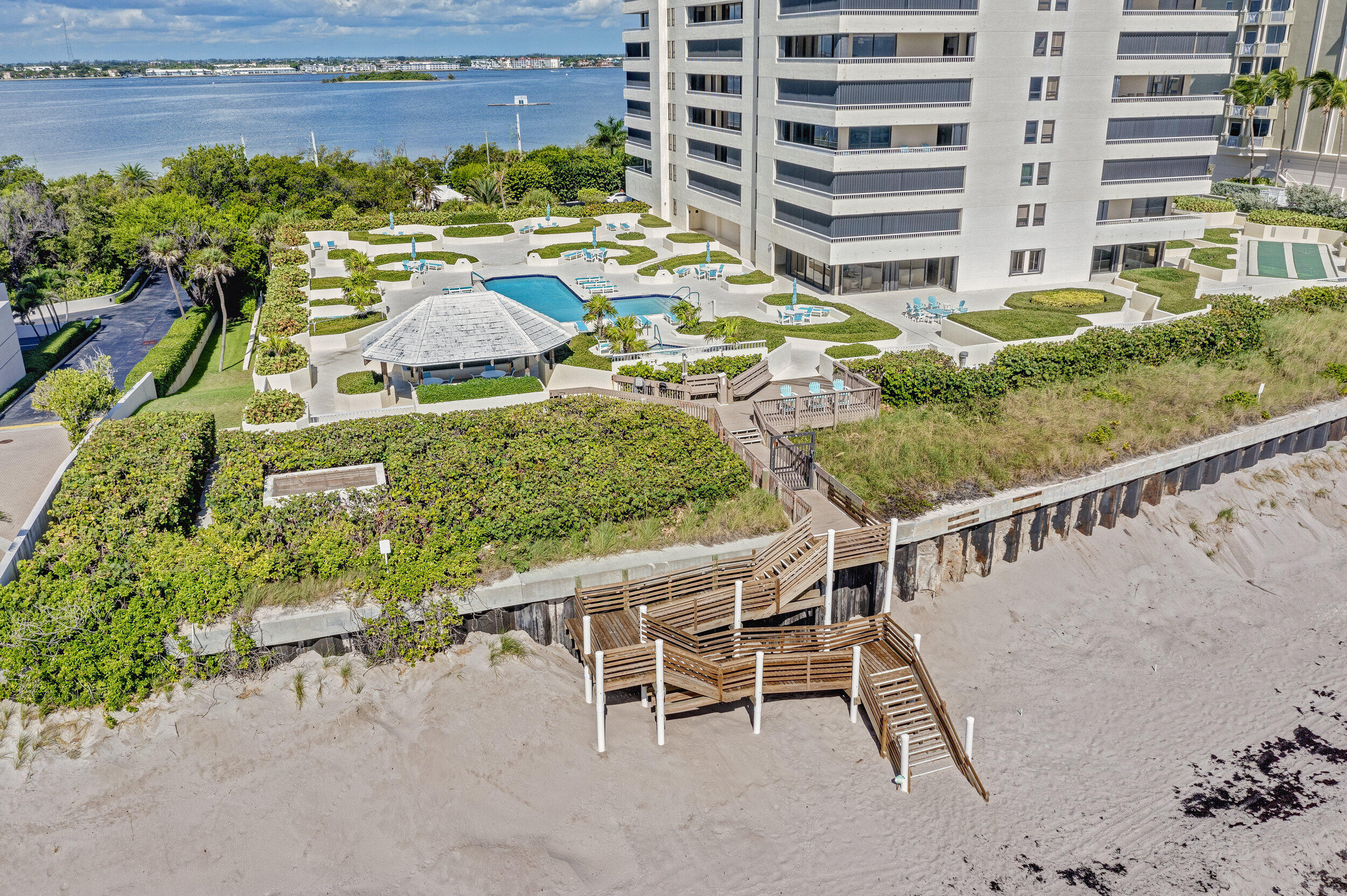 5280 North Ocean Drive, Unit 2F Singer Island, FL 33404 - Photo 77 of 92 a view of a chairs and table in the patio