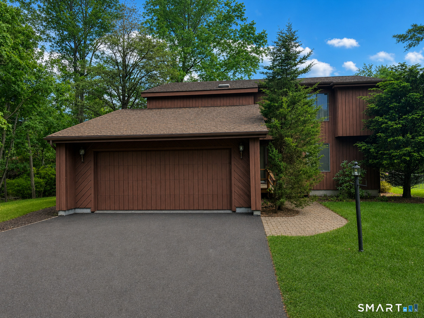 4 Ta'Agan Point Road Danbury, CT 06811 - Photo 1 of 22 a house with a yard