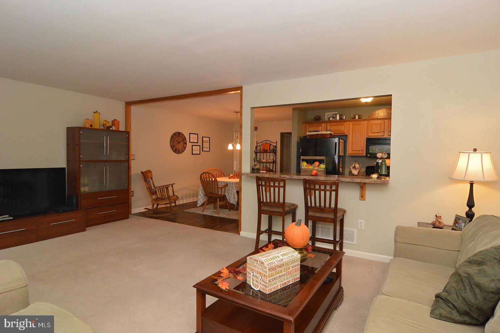 705 Caramist Circle Sinking Spring, PA 19608 - Photo 22 of 54 a bedroom with furniture and a flat screen tv