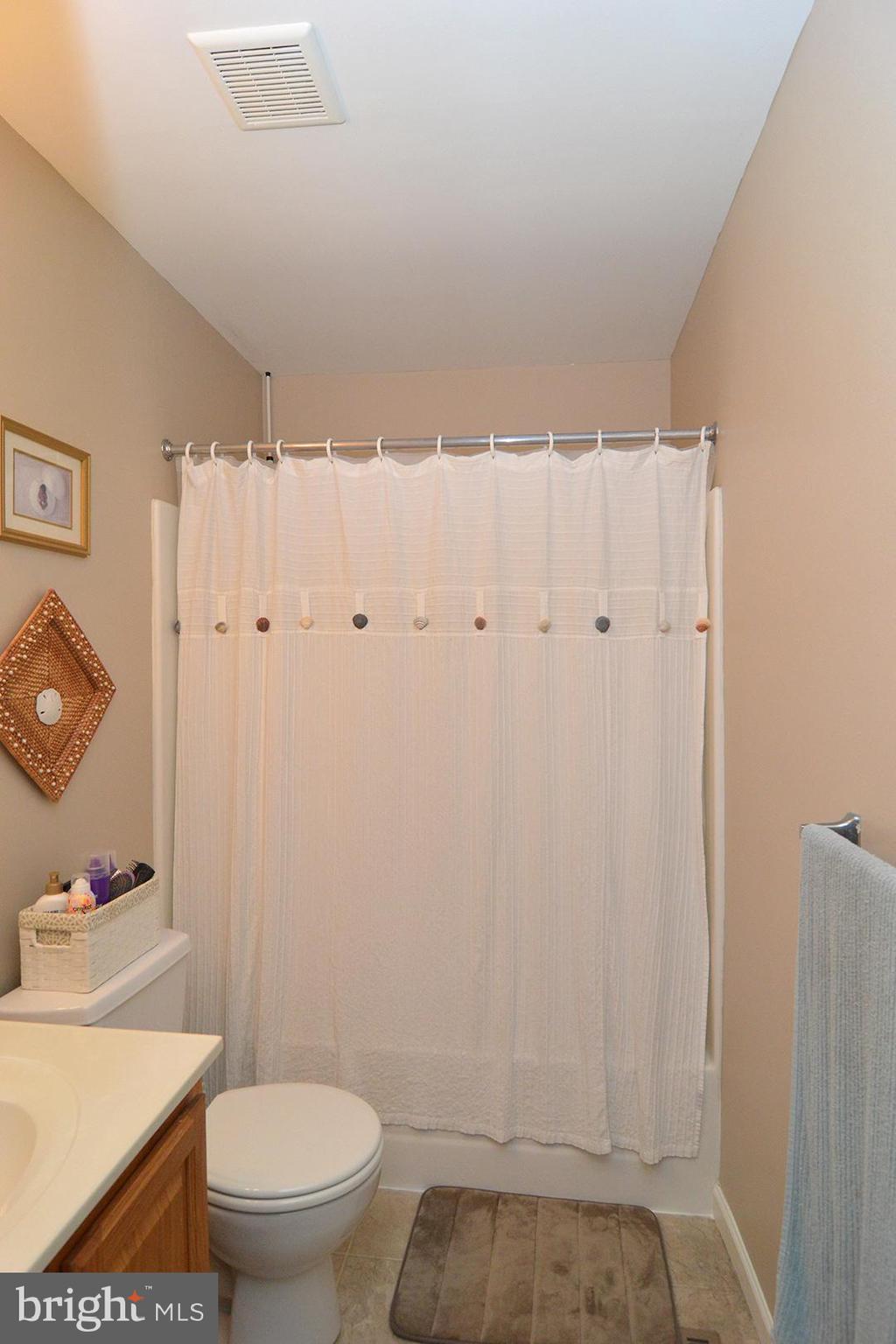 705 Caramist Circle Sinking Spring, PA 19608 - Photo 30 of 54 a bathroom with a toilet and a shower