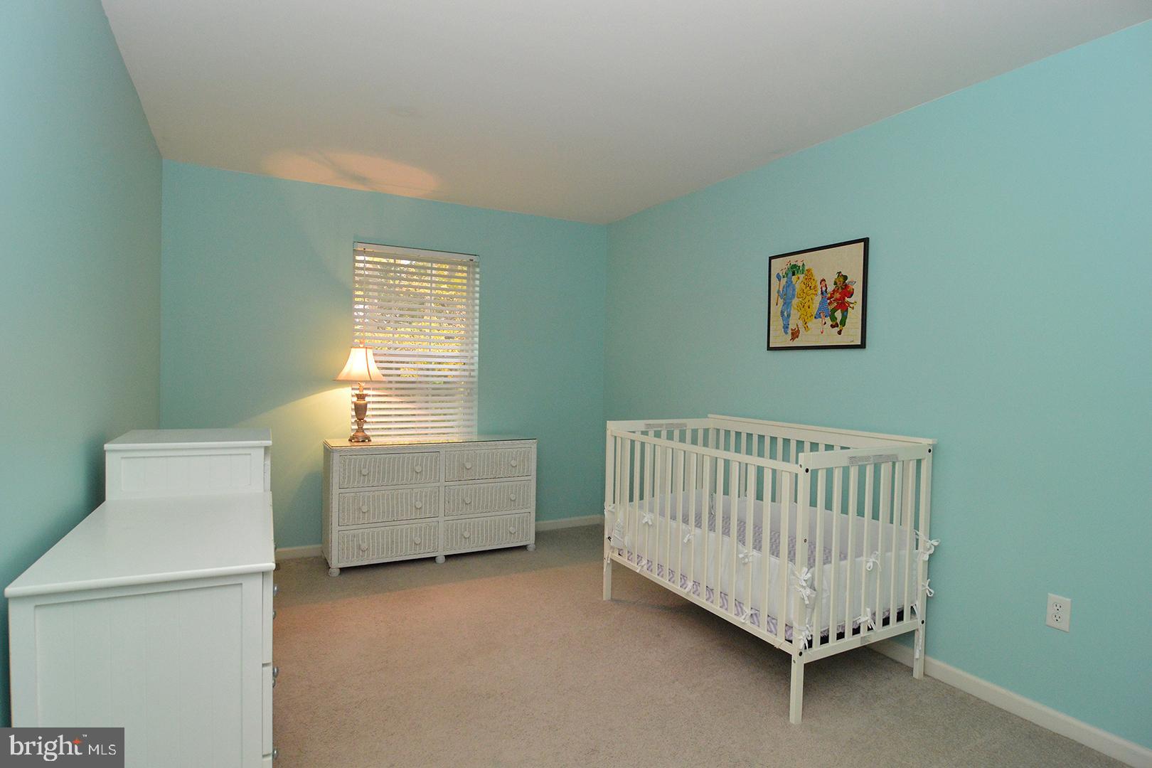 705 Caramist Circle Sinking Spring, PA 19608 - Photo 31 of 54 a bedroom with furniture and a window