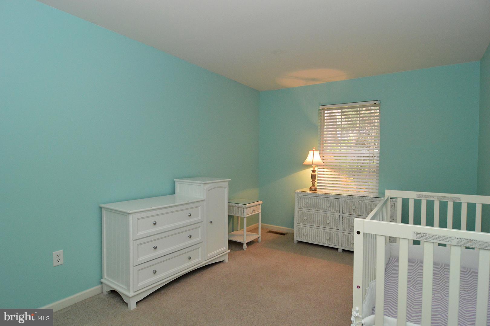 705 Caramist Circle Sinking Spring, PA 19608 - Photo 32 of 54 a bedroom with a bunk bed and a window