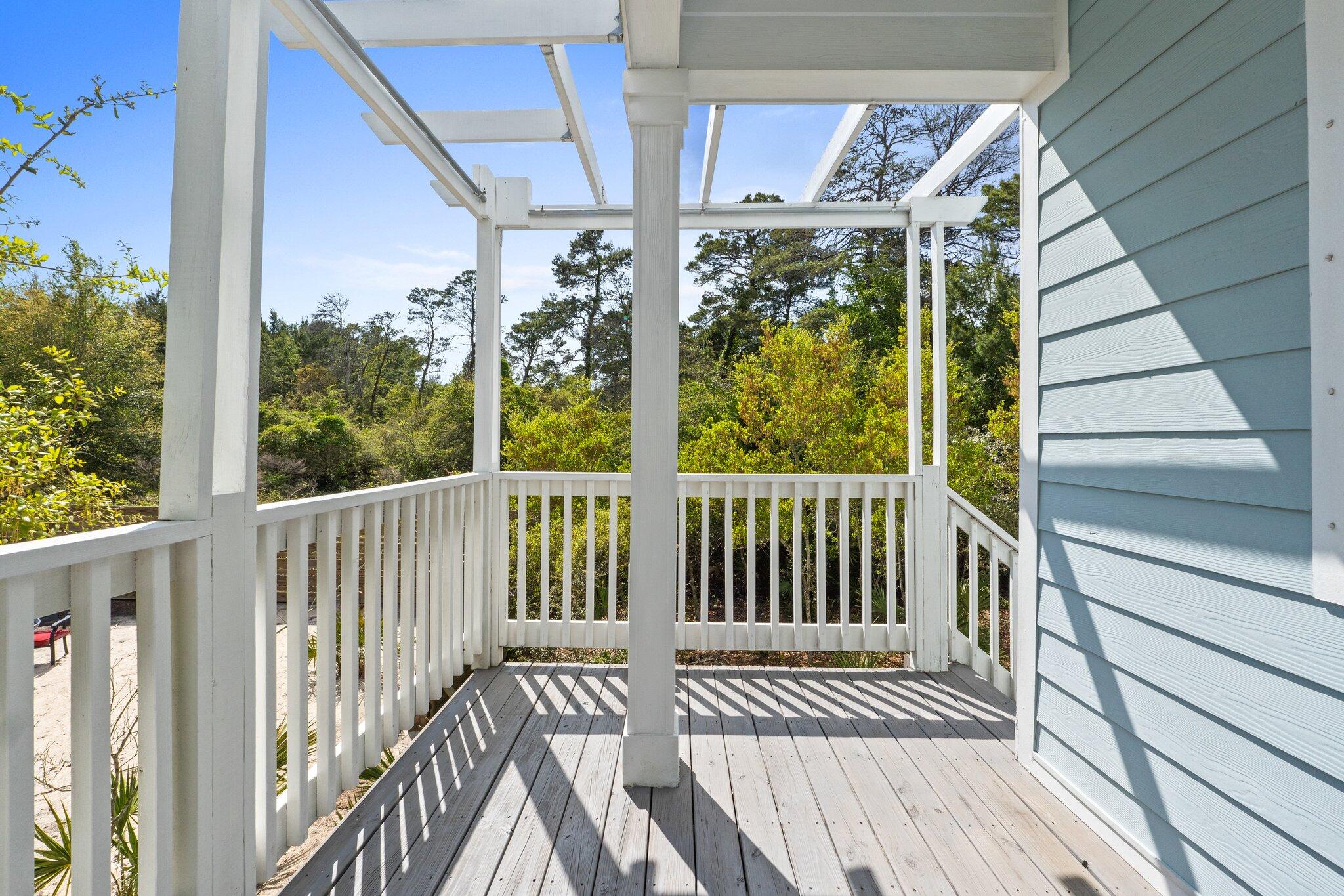 96 Sandpine Loop Inlet Beach, FL 32461 - Photo 16 of 38 a view of a balcony with wooden floor