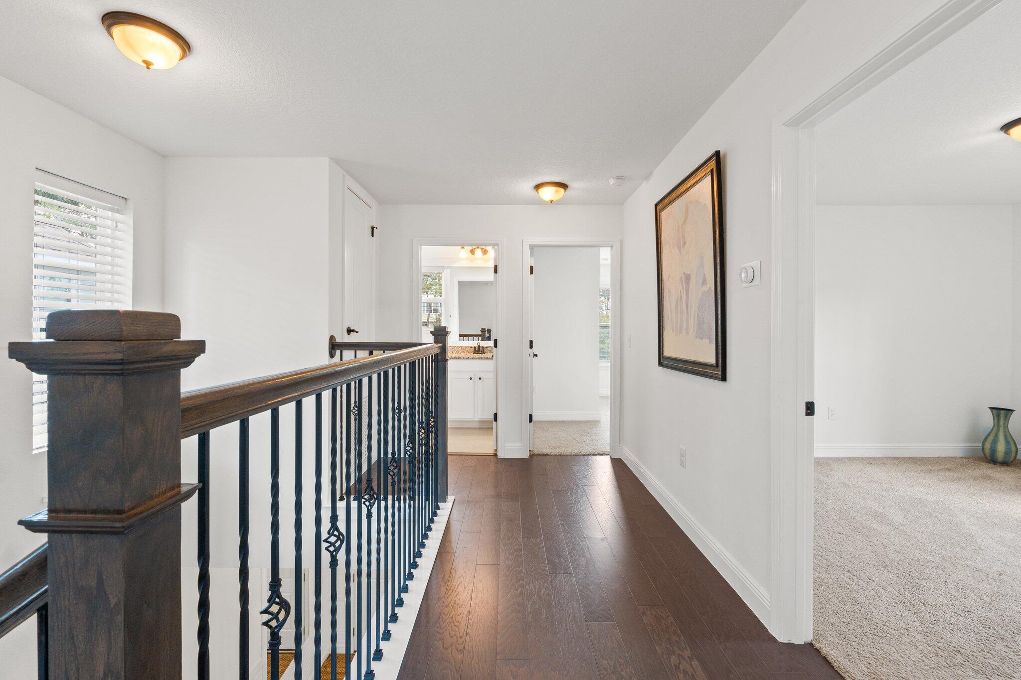 96 Sandpine Loop Inlet Beach, FL 32461 - Photo 20 of 38 a view of a hallway with wooden floor and staircase