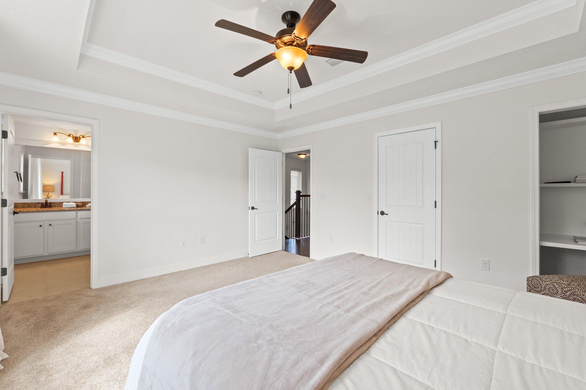 96 Sandpine Loop Inlet Beach, FL 32461 - Photo 23 of 38 a bedroom with a bed and a chandelier