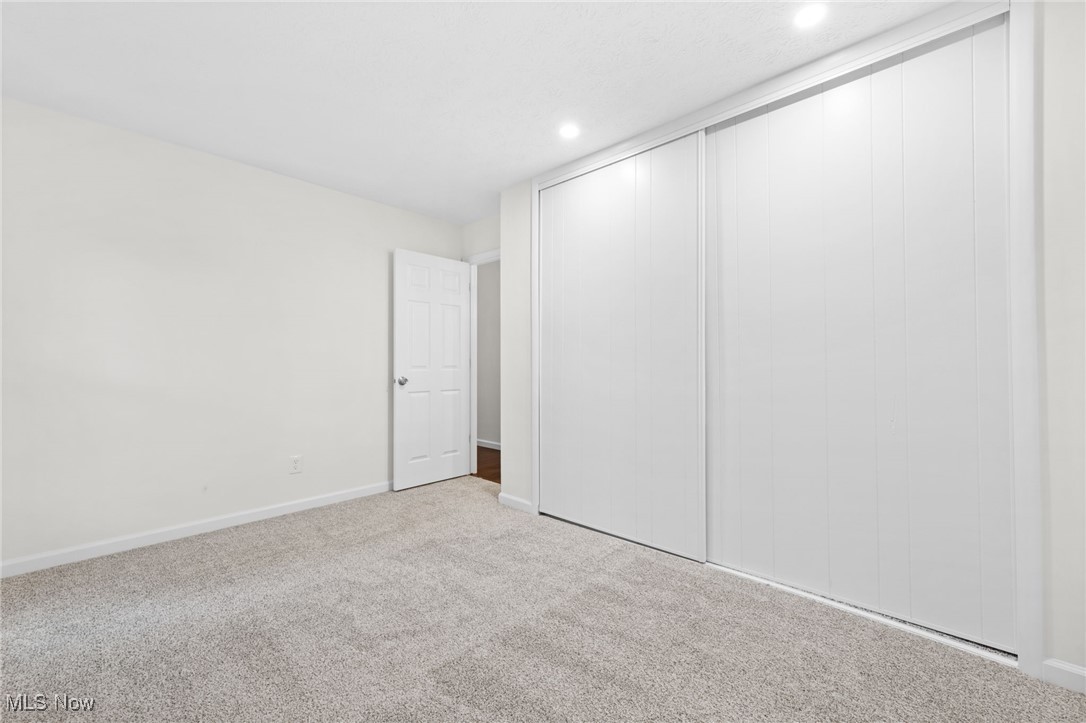 4098 State Road Medina, OH 44256 - Photo 24 of 41 Unfurnished bedroom featuring carpet flooring