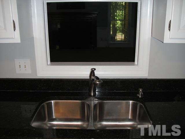 550 Weathergreen Drive Raleigh, NC 27615 - Photo 8 of 25 a close view of sink and microwave