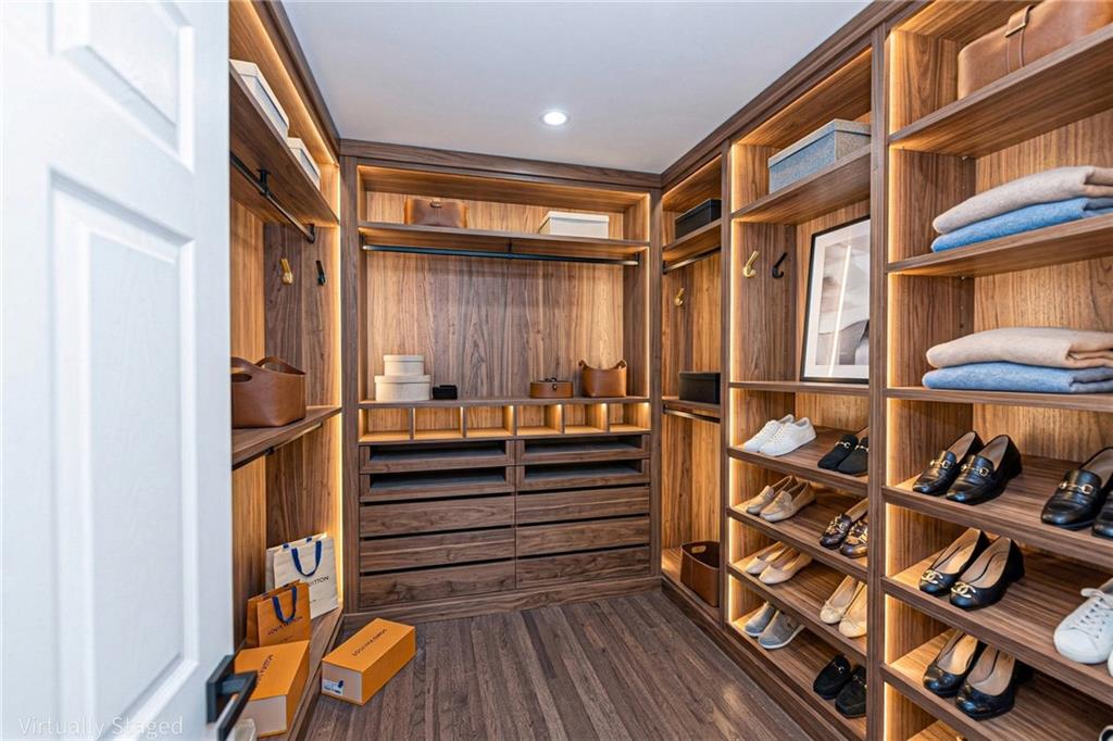 3013 Catalina Drive Decatur, GA 30032 - Photo 18 of 48 a view of walk in closet with clothes and shoes