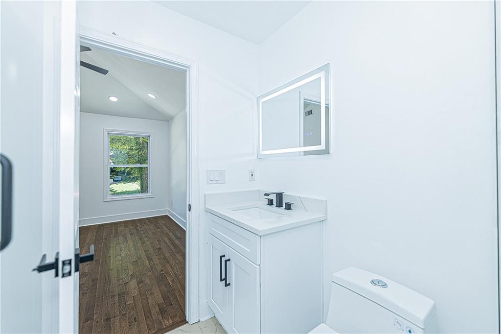 3013 Catalina Drive Decatur, GA 30032 - Photo 23 of 48 a bathroom with a sink toilet and vanity
