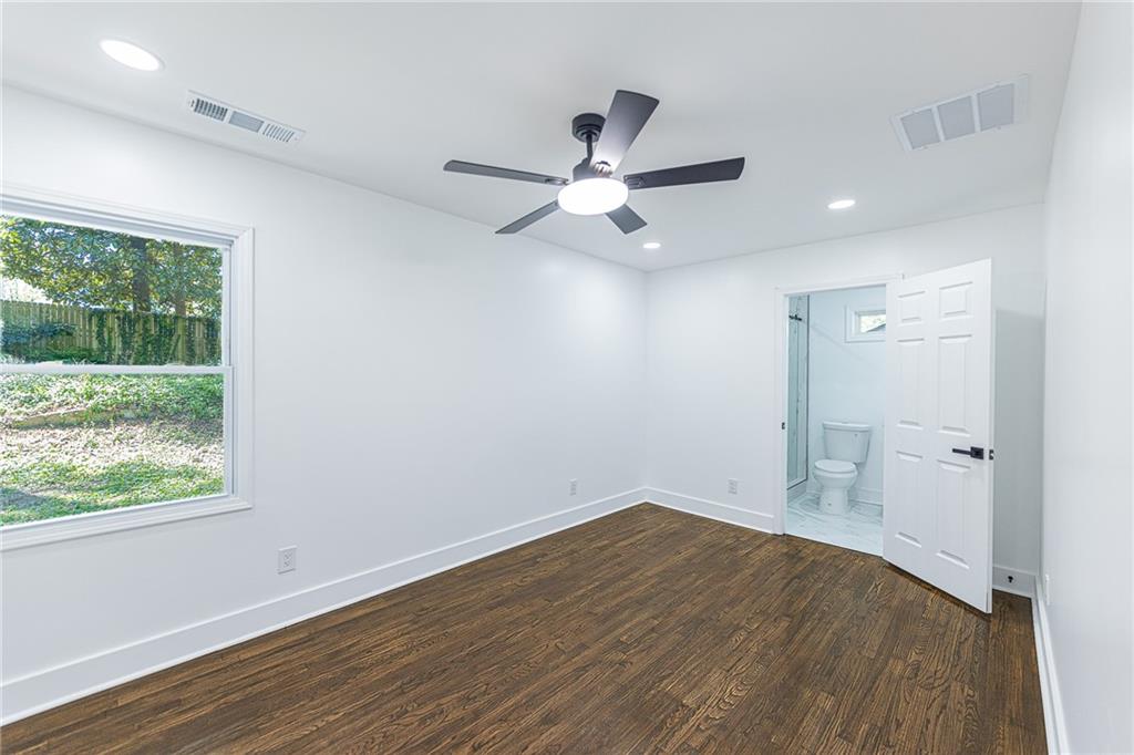 3013 Catalina Drive Decatur, GA 30032 - Photo 25 of 48 wooden floor in an empty room with a window