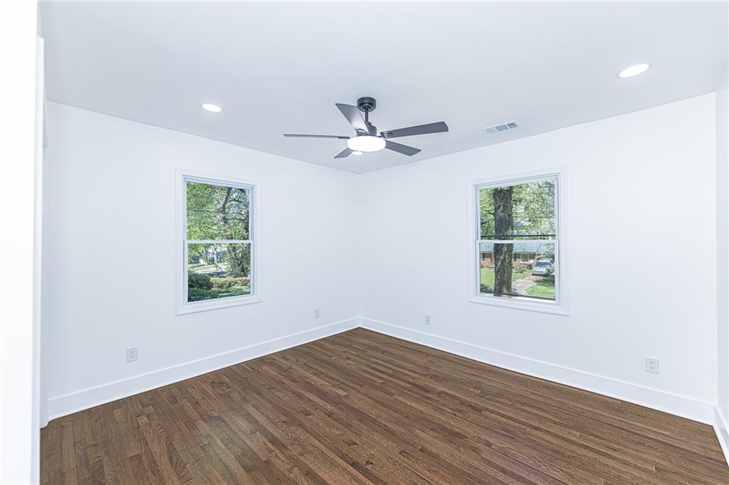3013 Catalina Drive Decatur, GA 30032 - Photo 31 of 48 an empty room with wooden floor and windows