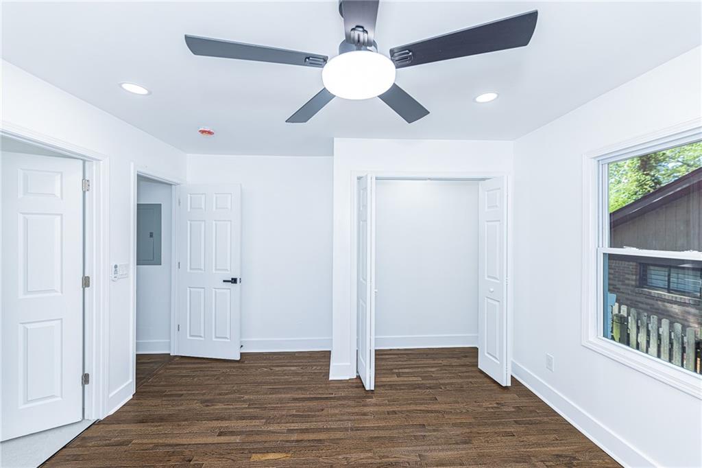 3013 Catalina Drive Decatur, GA 30032 - Photo 33 of 48 a view of an empty room with wooden floor and a window