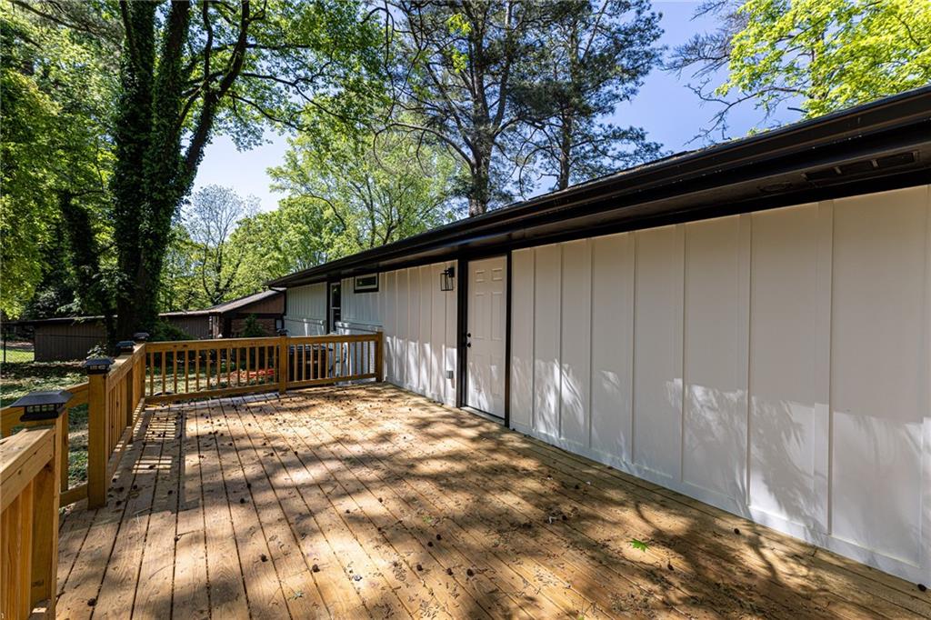 3013 Catalina Drive Decatur, GA 30032 - Photo 41 of 48 a view of backyard with large trees and wooden fence