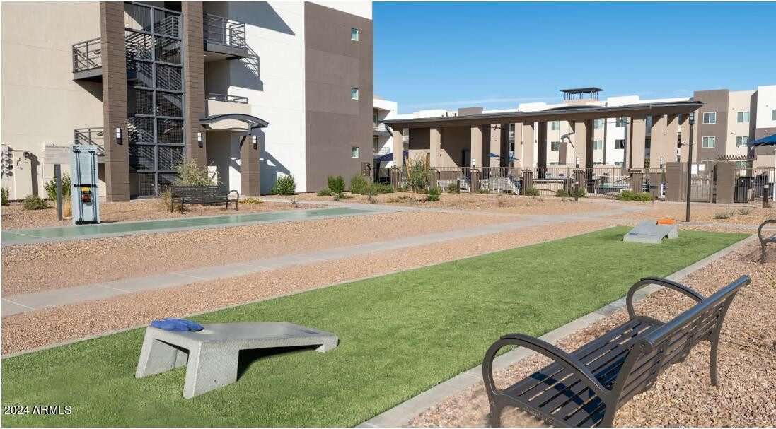 1441 East Germann Road, Unit 3 Chandler, AZ 85286 - Photo 16 of 21 swimming pool with outdoor seating and yard