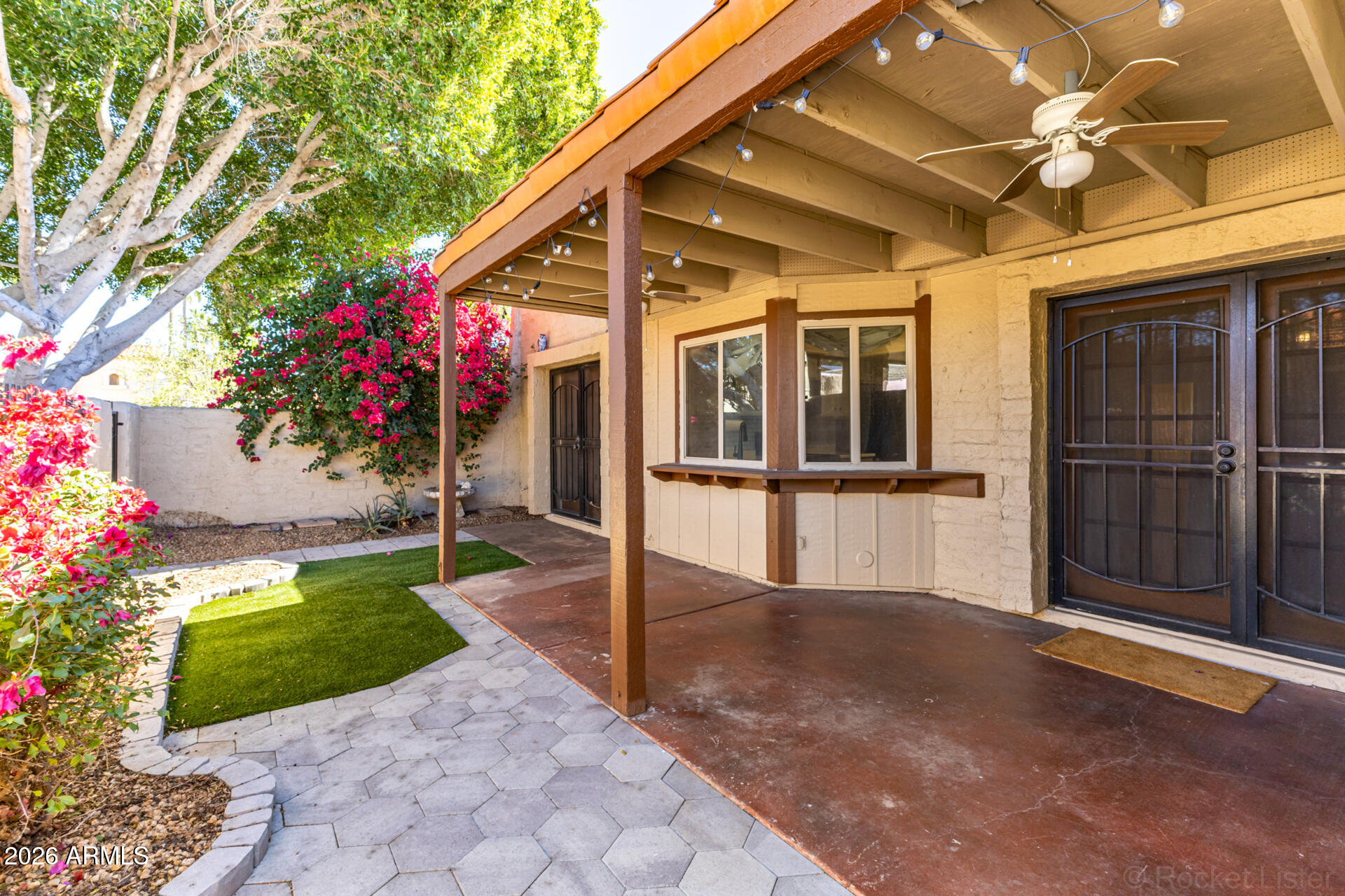 3004 West Phelps Road Phoenix, AZ 85053 - Photo 29 of 34 a view of a house with a porch