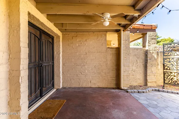 a view of a door with wooden walls