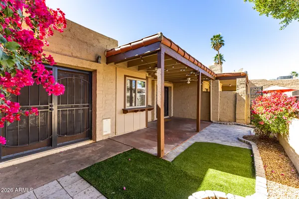 a front view of a house with yard