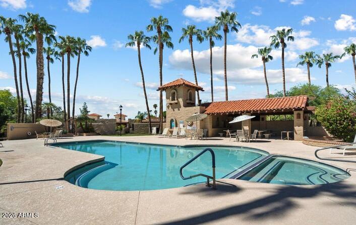3004 West Phelps Road Phoenix, AZ 85053 - Photo 33 of 34 a view of a swimming pool with a lounge chair