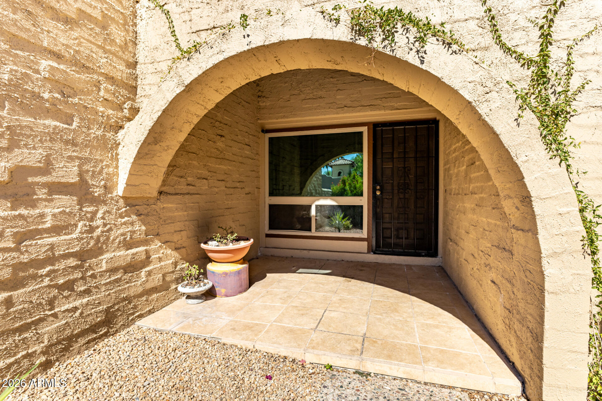 3004 West Phelps Road Phoenix, AZ 85053 - Photo 4 of 34 a view of a wooden door of the house