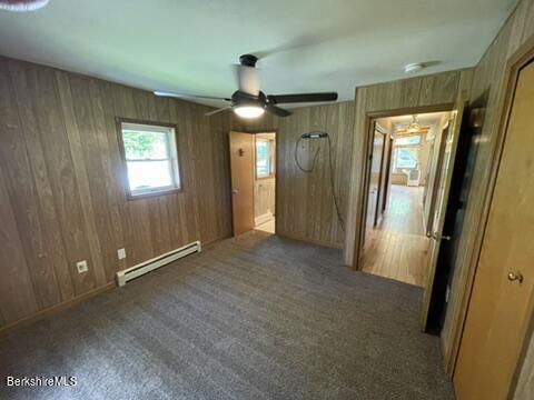 604 Loop Road Savoy, MA 01256 - Photo 12 of 23 an empty room with closet and wooden floor