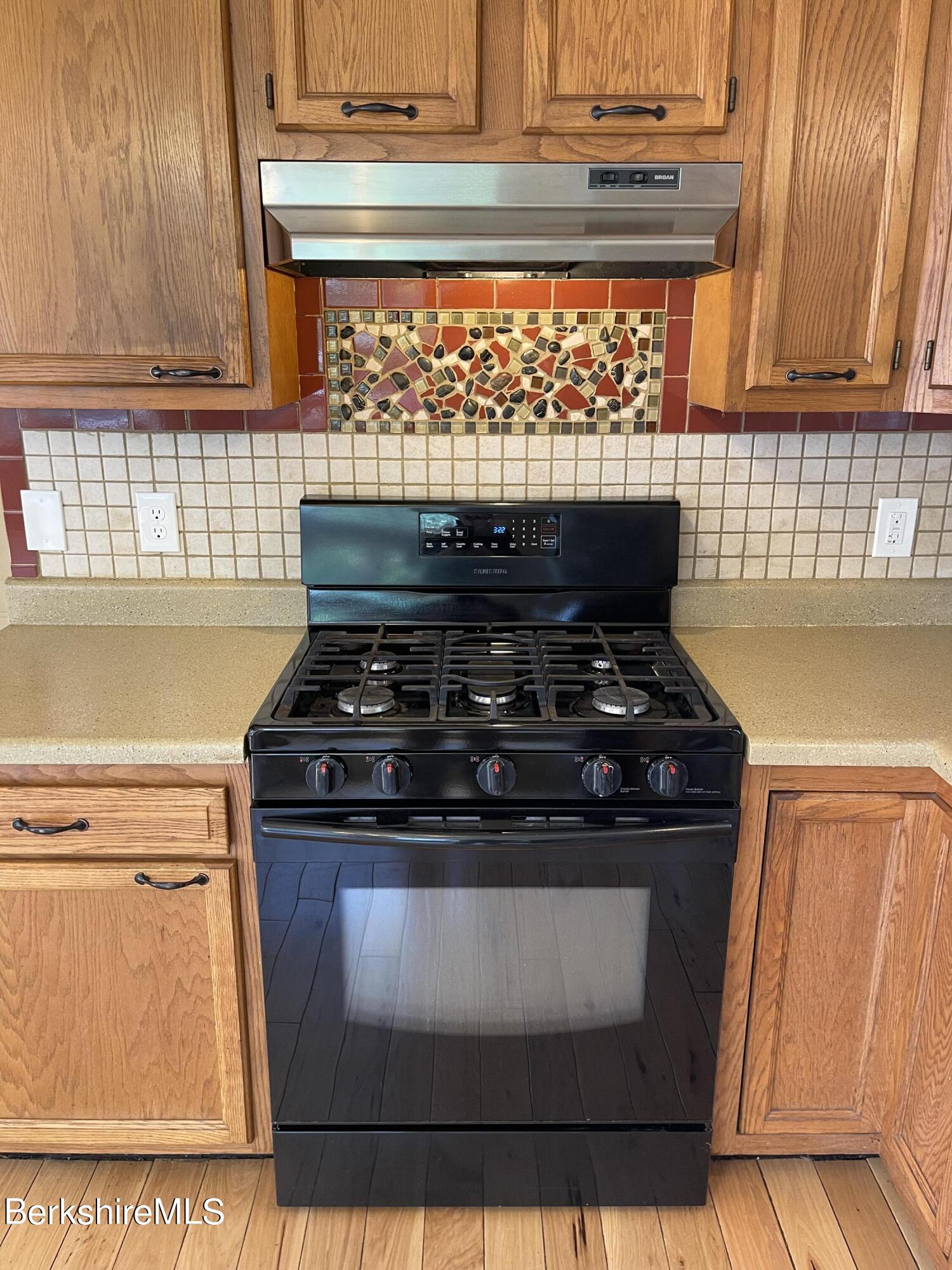604 Loop Road Savoy, MA 01256 - Photo 5 of 23 a stove top oven sitting inside of a kitchen