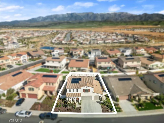a view of residential houses with outdoor space and river