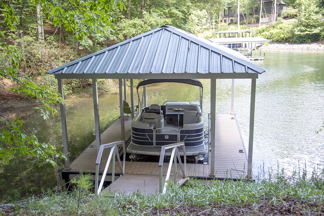 601 Wind Flower Drive Sunset, SC 29685 - Photo 10 of 11 A private boat dock and covered slip beckons for lakeside recreation.