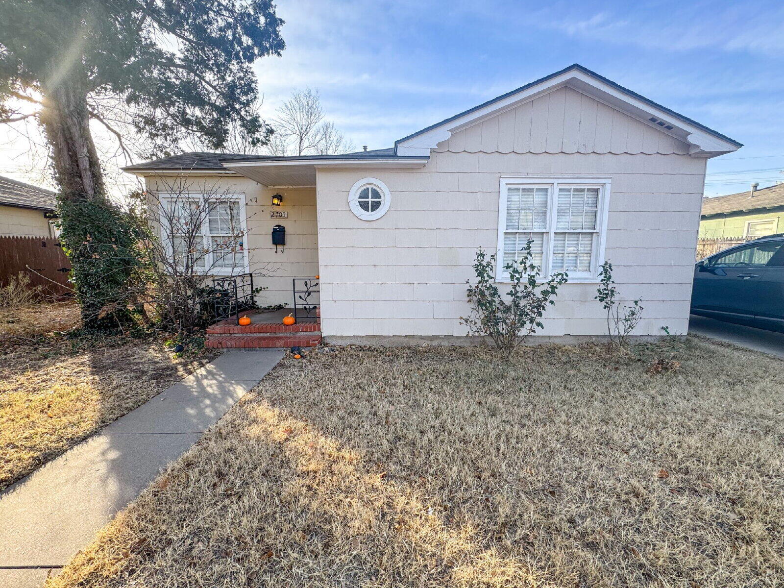 2705 30th Street Lubbock, TX 79410 - Photo 2 of 2 a view of a house with a yard