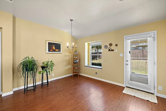 a kitchen with stainless steel appliances granite countertop a stove and a sink