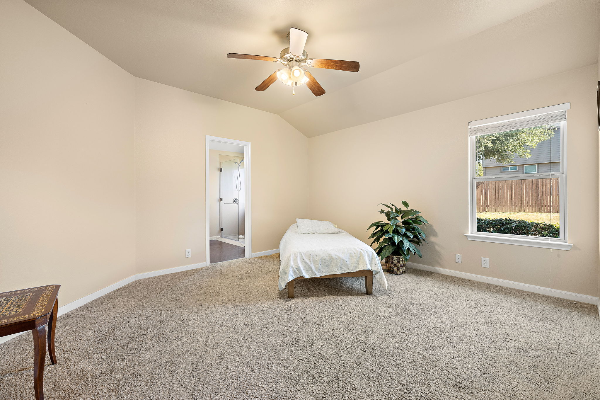 227 Avalanche Avenue Georgetown, TX 78626 - Photo 13 of 27 Carpeted bedroom featuring lofted ceiling and ceiling fan