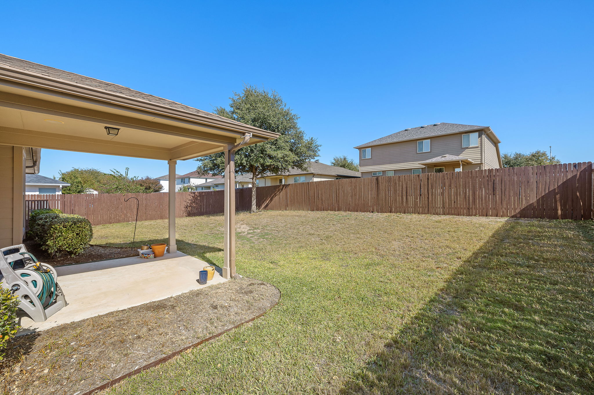 227 Avalanche Avenue Georgetown, TX 78626 - Photo 21 of 27 Fenced backyard with a patio