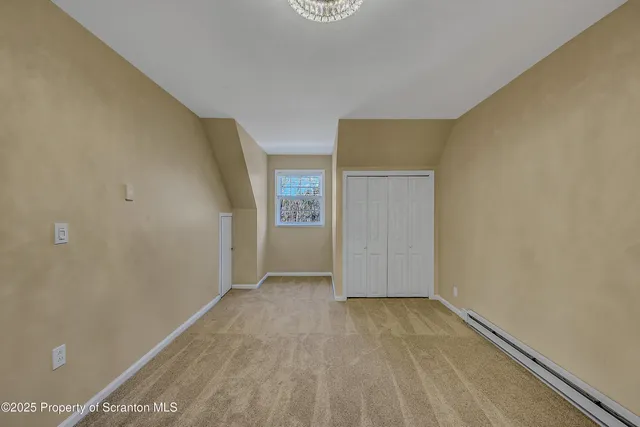 a view of a big room with wooden floor
