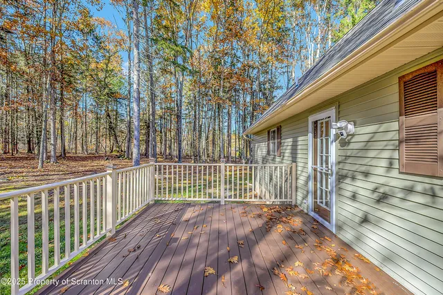 a view of a wooden fence