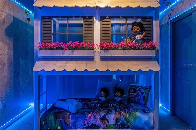 a view of a livingroom with furniture and chandelier