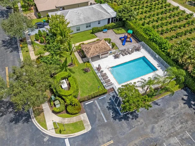 an aerial view of a house with garden