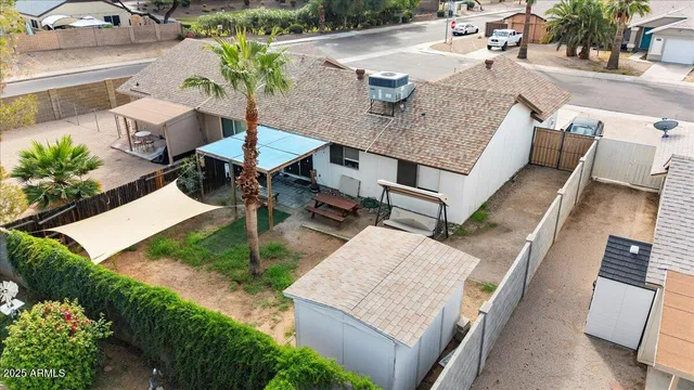 a terrace of a house with outdoor seating