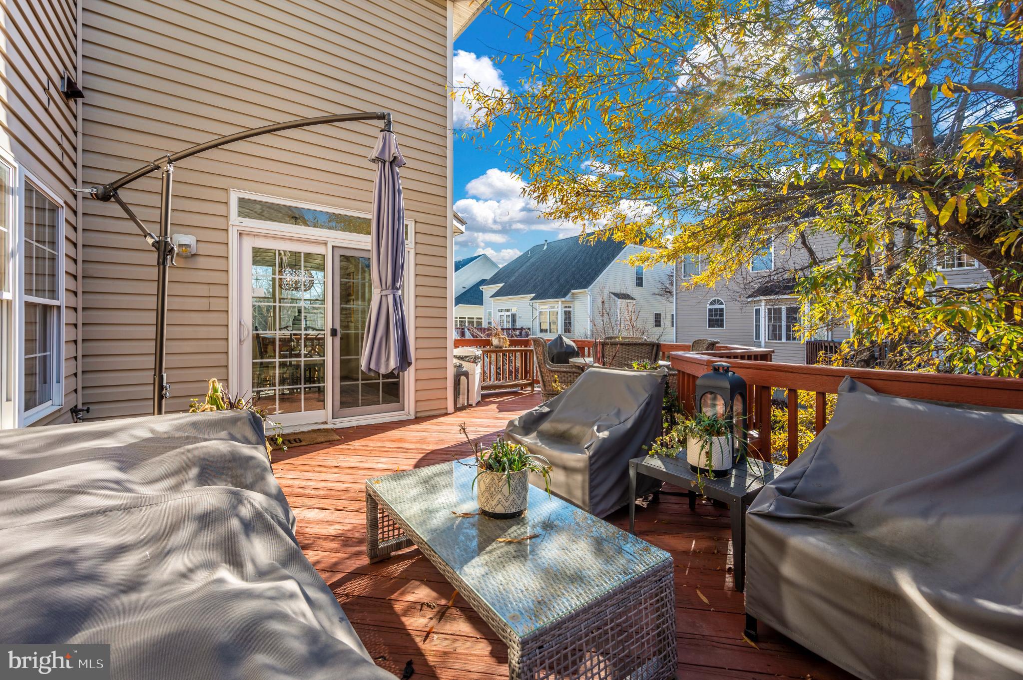 2575 Bear Den Road Frederick, MD 21701 - Photo 19 of 38 Sunny deck retreat with vibrant autumn hues.