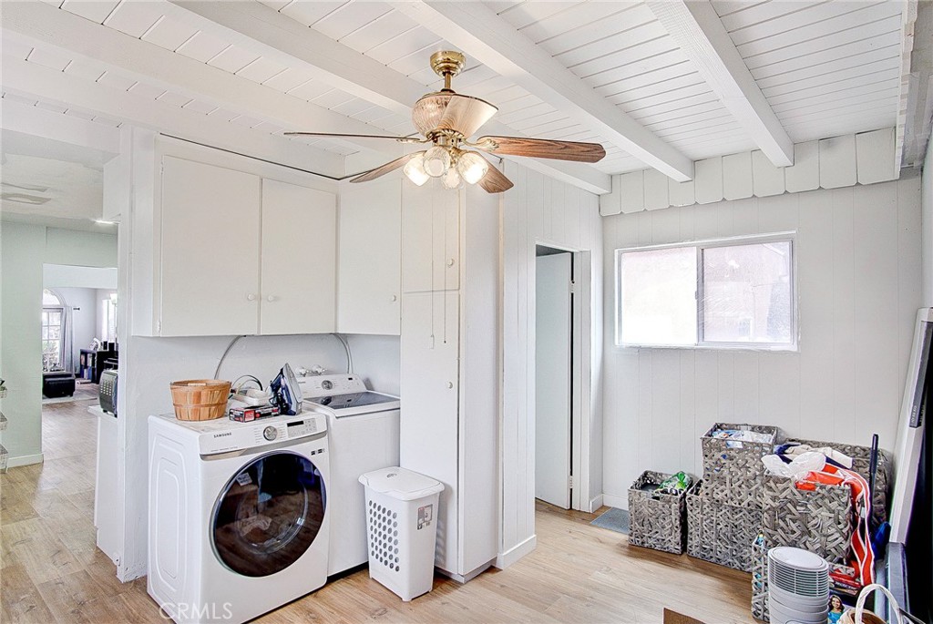 701 Westminster Avenue Alhambra, CA 91803 - Photo 14 of 35 a view of a storage and utility room with washer and dryer