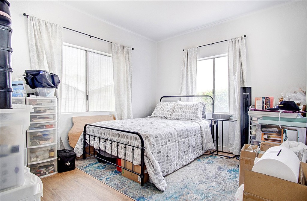 701 Westminster Avenue Alhambra, CA 91803 - Photo 15 of 35 a bedroom with a bed and a window