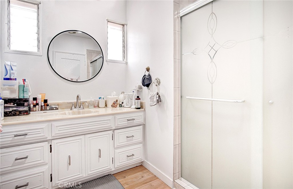 701 Westminster Avenue Alhambra, CA 91803 - Photo 17 of 35 a bathroom with a sink and a mirror