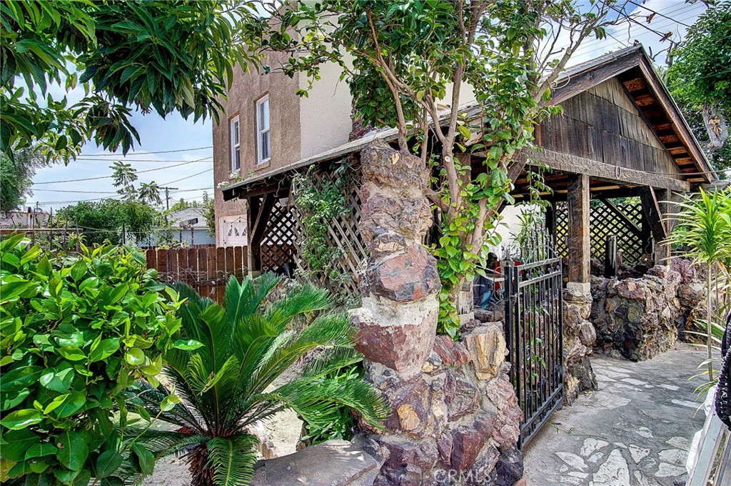 701 Westminster Avenue Alhambra, CA 91803 - Photo 22 of 35 a backyard of a house with lots of green space