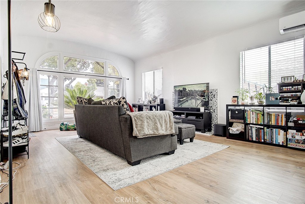 701 Westminster Avenue Alhambra, CA 91803 - Photo 4 of 35 a living room with furniture and a flat screen tv