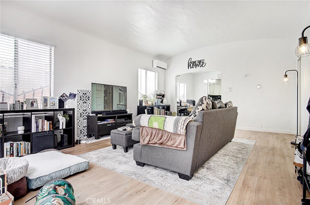 701 Westminster Avenue Alhambra, CA 91803 - Photo 7 of 35 a living room with furniture and a flat screen tv