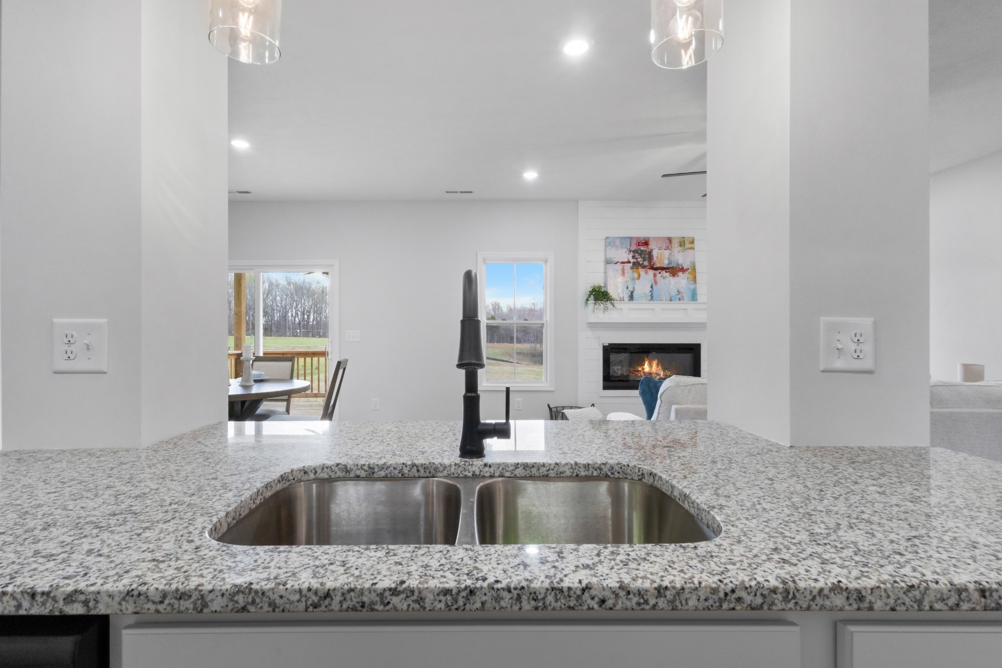 1192 Boulder Pass Road Clarksville, TN 37040 - Photo 14 of 26 a kitchen with granite countertop a sink and a granite counter top