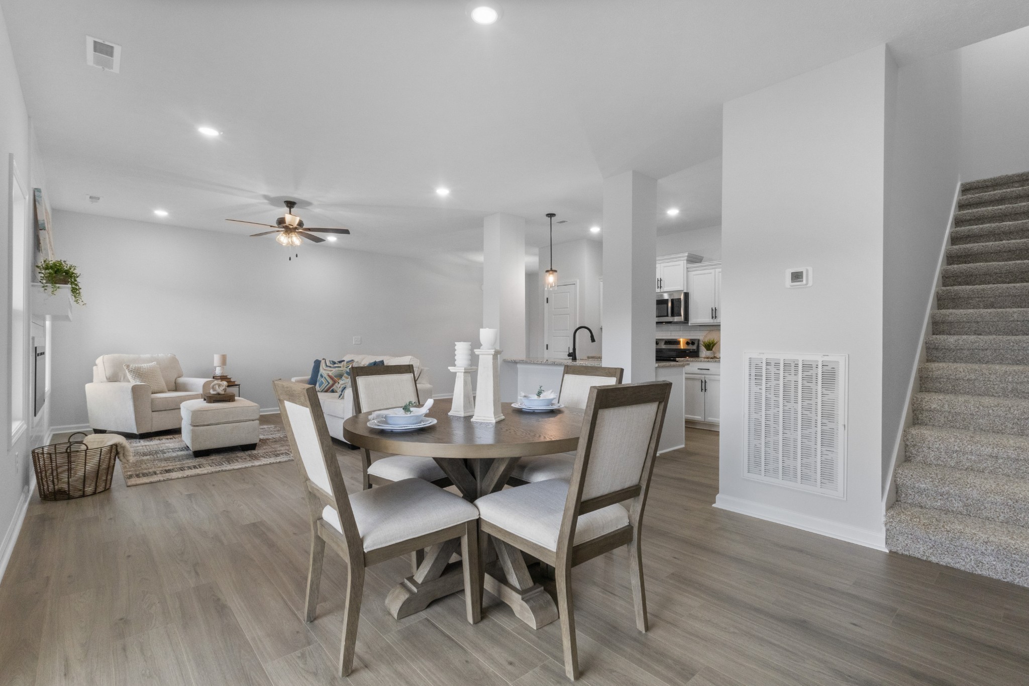 1192 Boulder Pass Road Clarksville, TN 37040 - Photo 17 of 26 a dining room with furniture and wooden floor